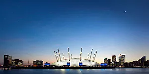 The O2 Arena in London seen in the evening across the Thames river