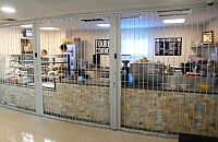 FlexiGlide classic chainlink closed in front of a food servery