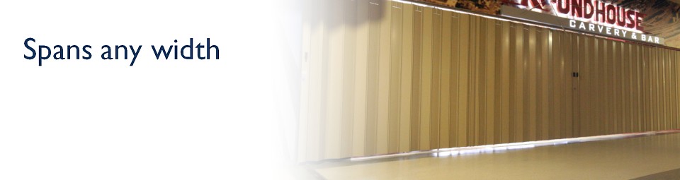 A long sliding folding security shutter; Spans any width