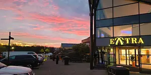 Cars parked at extra service station