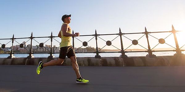 Person running on sports shoes