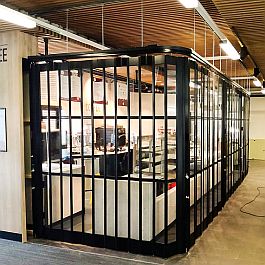 A black FlexiGlide sliding shutter installed at Bristol university