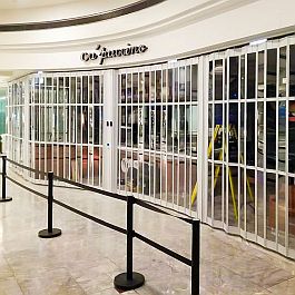 sideview of a closed sliding shutter - the polycarbonate panels are clearly visible
