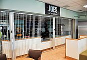 sliding security shutter closing off a counter area
