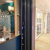 A sliding shutter opened and stacked to the side
