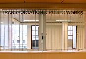 Front view of a bi-parting sliding shutter on a reception desk