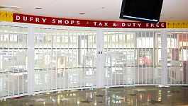 Vision Air sliding shutter with a light curve in front of a shop opening at Borg El Arab Airport in Egypt