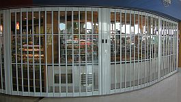 Detail of vision glass sliding shutter panels, filled with polycarbonate glazing