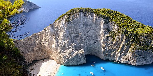Rocky outcrop in a blue sea at the Greek island of Zakynthos