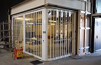 FlexiGlide vision glass sliding shutter installation in progress