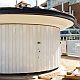 Solid curtain sliding shutter going round a kiosk