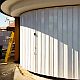 detail of a white sliding shutter with solid panels