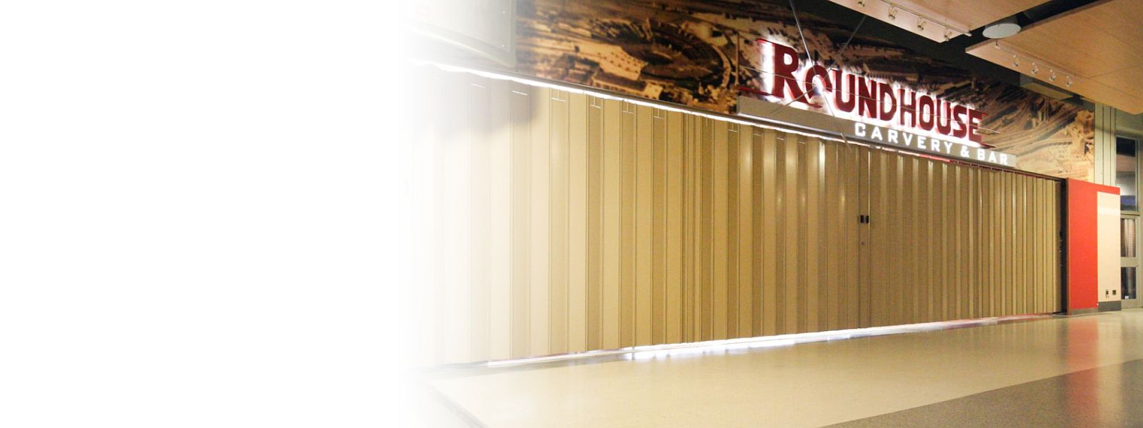 A horizontally sliding security shutter