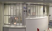 bi-parting sliding shutter with high and low sections at reception counter
