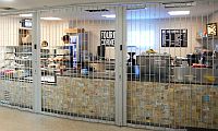 sliding shutter with fine lines at a food servery