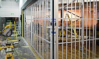 Vision Glass bi-parting FlexiGlide sliding security shutter just after installation