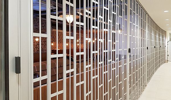 An extra wide sliding folding security shutter